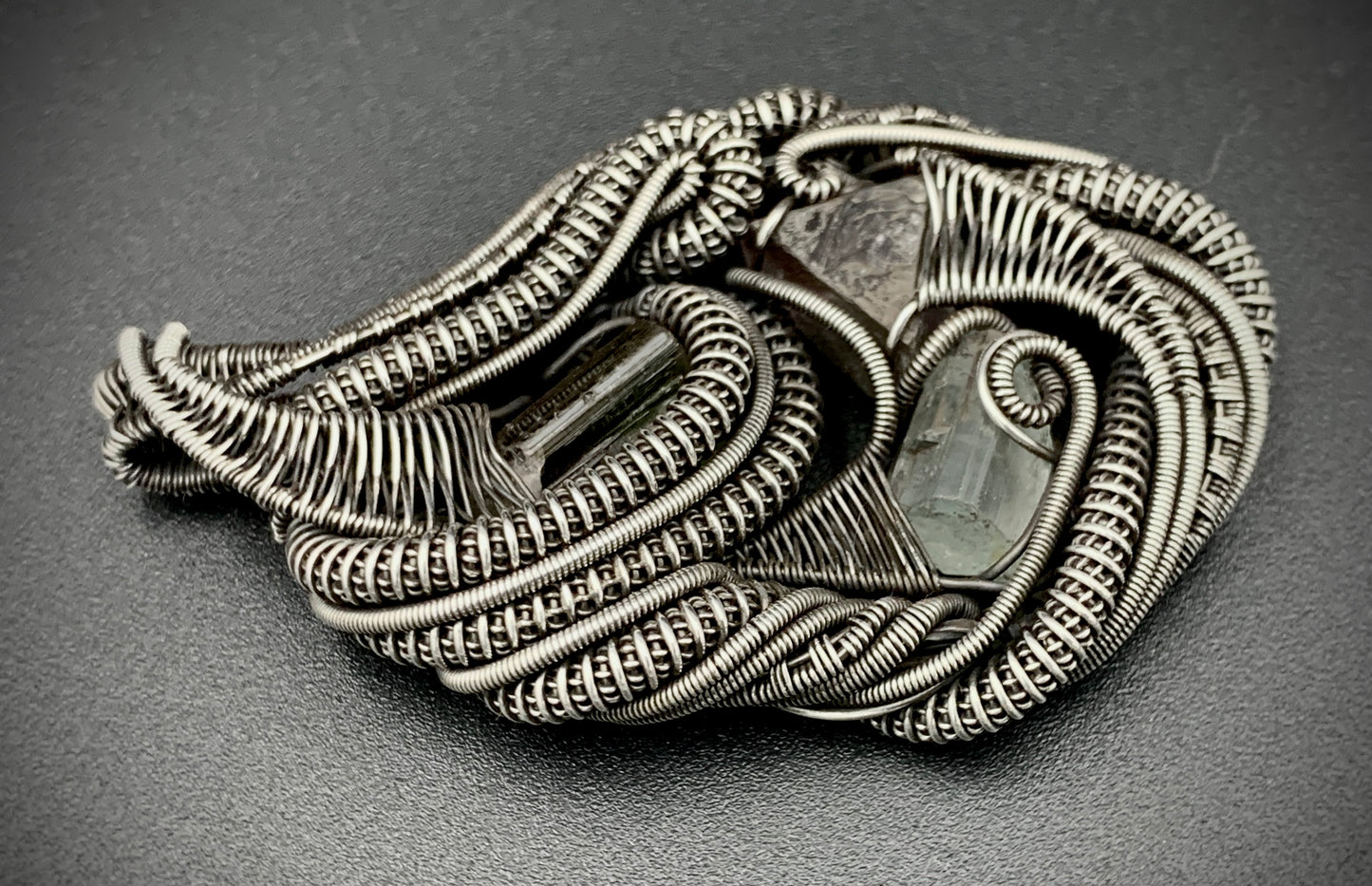 HEART OF THE BUDDHA WIRE WRAP PENDANT